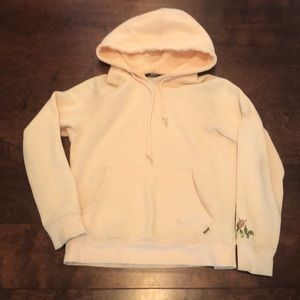 Peach colored hoodie